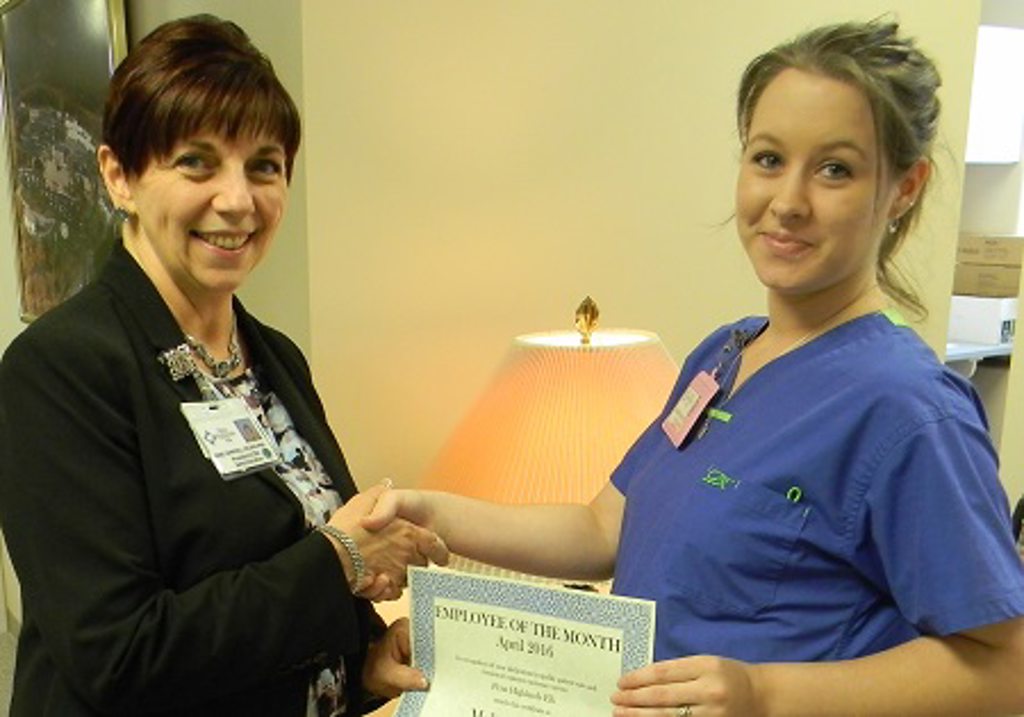 Rose Campbell, president at Penn Highlands Elk, presents the award to Jackie Shuttleworth