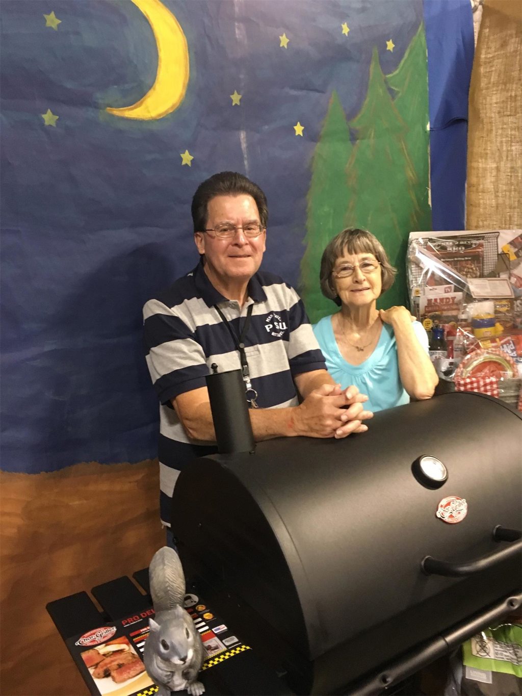 Shown are Donald Dinant and Donna Veihdeffer, volunteers with Penn Highlands Community Nurses Hospice, preparing the raffle prizes for display. 