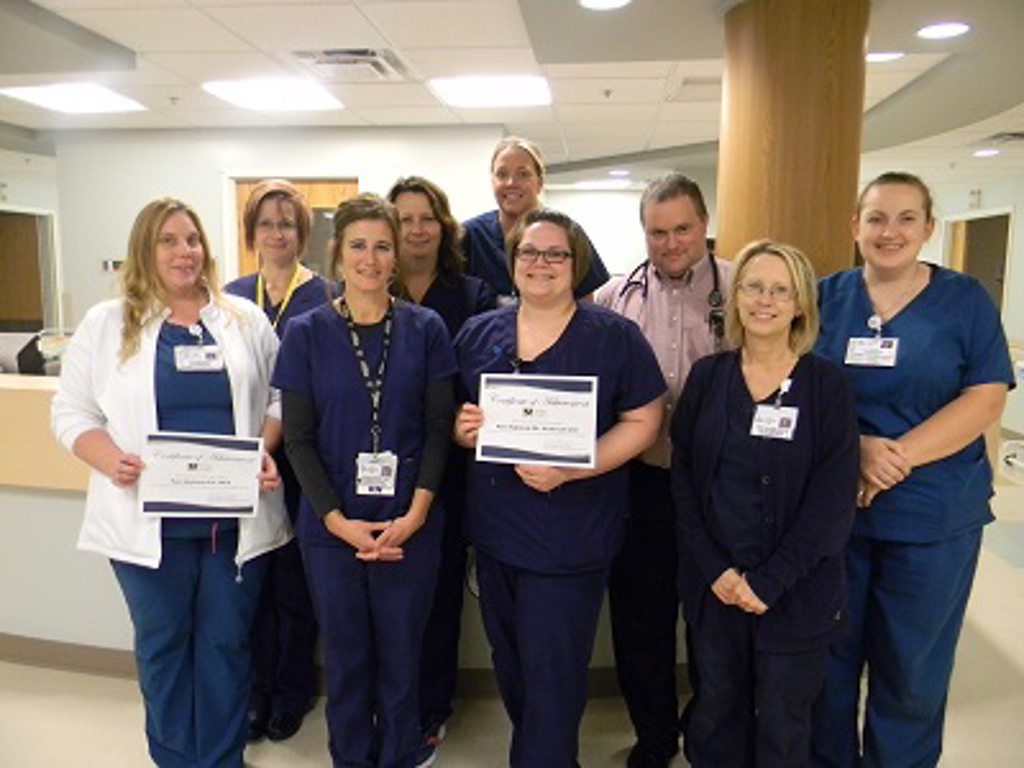 Front row: Kim Johnston CNA, Michelle Eckert RN, Katie Fink RN, Cindy Salerno RN Director Back row: Shiela Hopkins RN, Kristin Schmader RN, Crystal Rippy CNA, Dr. Thomas Baker, Lacy Fink CNA